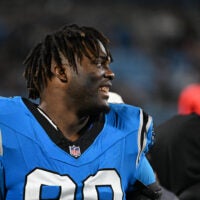 Aug 28, 2026; Charlotte, North Carolina, USA; Carolina Panthers defensive tackle Cam Jackson (99) on the sidelines in the third quarter at Bank of America Stadium.