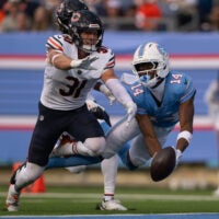 Aug 29, 2026; Nashville, Tennessee, USA; Chicago Bears safety Dillon Thieneman (31) breaks up pass thrown to Tennessee Titans wider receiver Carnell Tate (14) during the first half at Nissan Stadium.