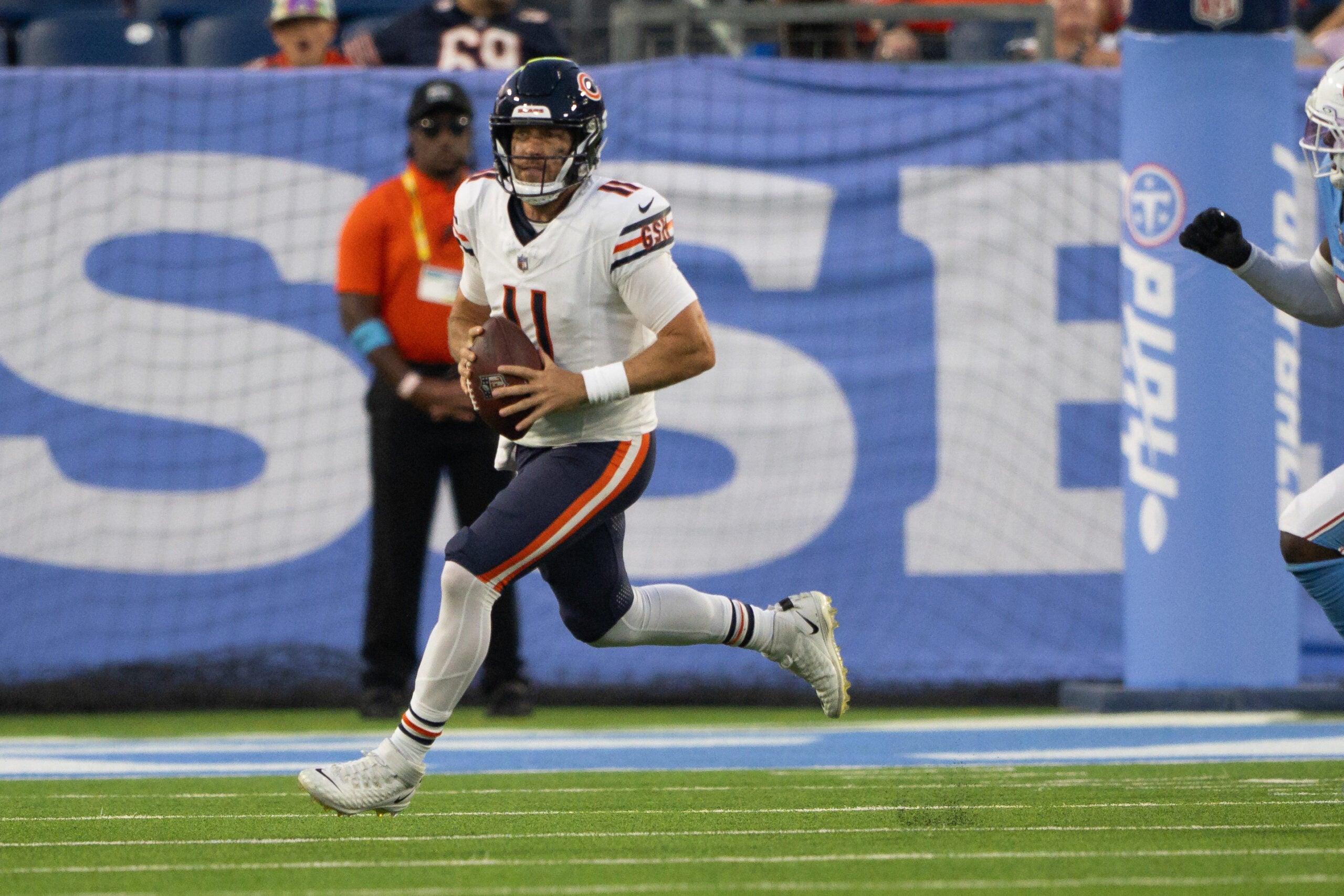 Aug 29, 2026; Nashville, Tennessee, USA; Chicago Bears quarterback Case Keenum (11) rolls out against the Tennessee Titans during the second half at Nissan Stadium.