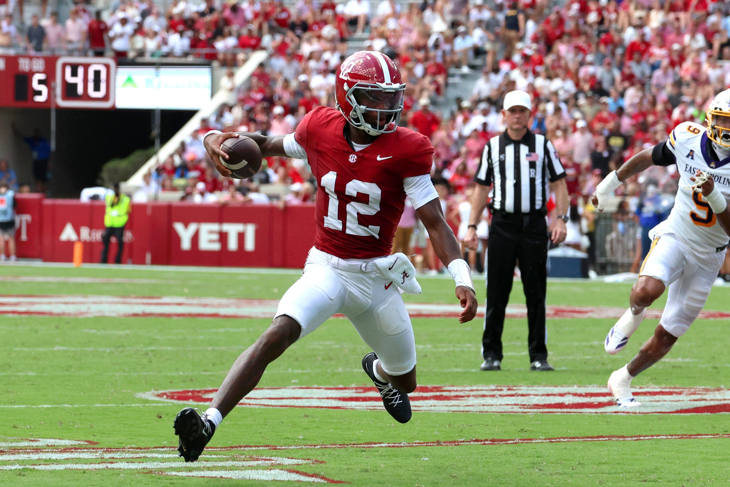 ep 5, 2026; Tuscaloosa, Alabama, USA; Alabama Crimson Tide quarterback Keelon Russell (12) carries the ball during the first quarter against the East Carolina Pirates at Saban Field at Bryant-Denny Stadium.