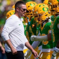 Oregon head coach Dan Lanning walks the field during warmups as the Oregon Ducks host the Boise State Broncos on Sept. 5, 2026, at Autzen Stadium in Eugene, Oregon.