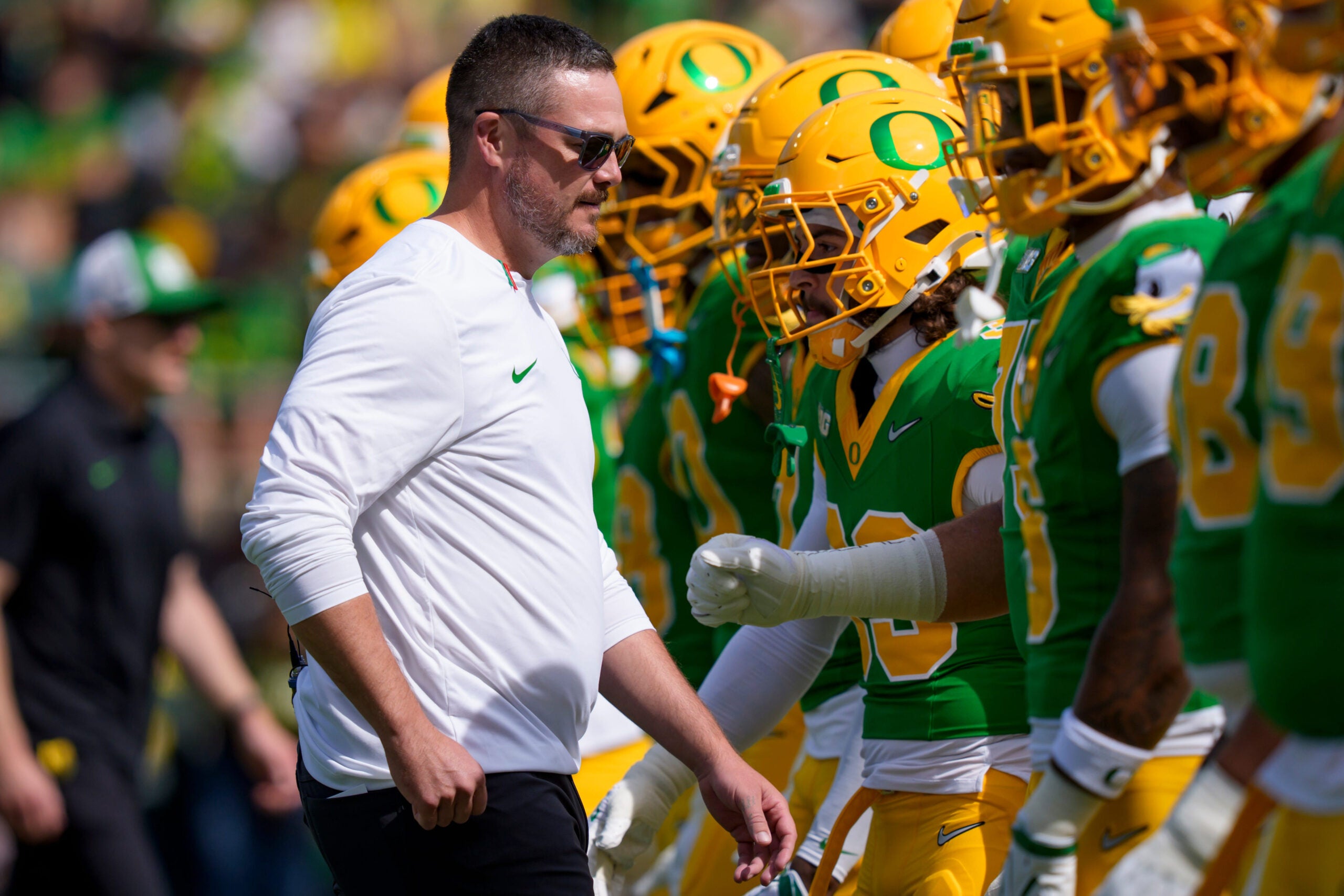 Oregon head coach Dan Lanning walks the field during warmups as the Oregon Ducks host the Boise State Broncos on Sept. 5, 2026, at Autzen Stadium in Eugene, Oregon.