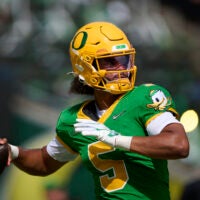Sep 5, 2026; Eugene, Oregon, USA; Oregon Ducks quarterback Dante Moore (5) warms up before a game against the Boise State Broncos at Autzen Stadium.