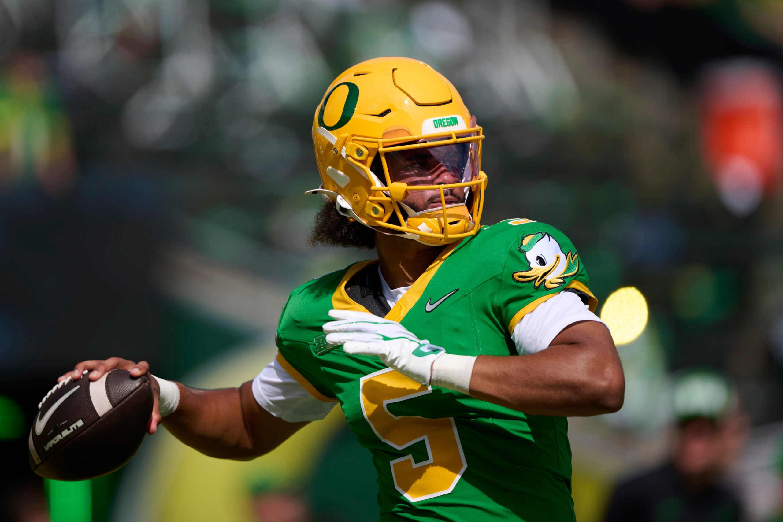 Sep 5, 2026; Eugene, Oregon, USA; Oregon Ducks quarterback Dante Moore (5) warms up before a game against the Boise State Broncos at Autzen Stadium.