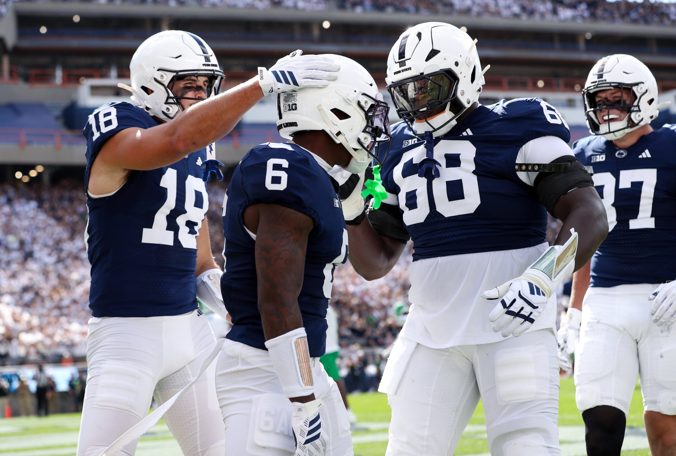 Sep 5, 2026; University Park, Pennsylvania, USA; Penn State Nittany Lions wide receiver Koby Howard (6) is congratulated by teammates after scoring a touchdown during the first quarter against the Marshall Thundering Herd at West Shore Home Field at Beaver Stadium.