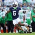 Sep 5, 2026; University Park, Pennsylvania, USA; Penn State Nittany Lions wide receiver Koby Howard (6) runs with the ball while avoiding a tackle from Marshall Thundering Herd defensive back Caleb Clark-Glover (0) during the first quarter at West Shore Home Field at Beaver Stadium.
