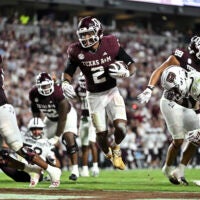 Sep 5, 2026; College Station, Texas, USA; Texas A&M Aggies running back Jamarion Morrow (2) scores a touchdown during the third quarter against the Missouri State Bears at Kyle Field.