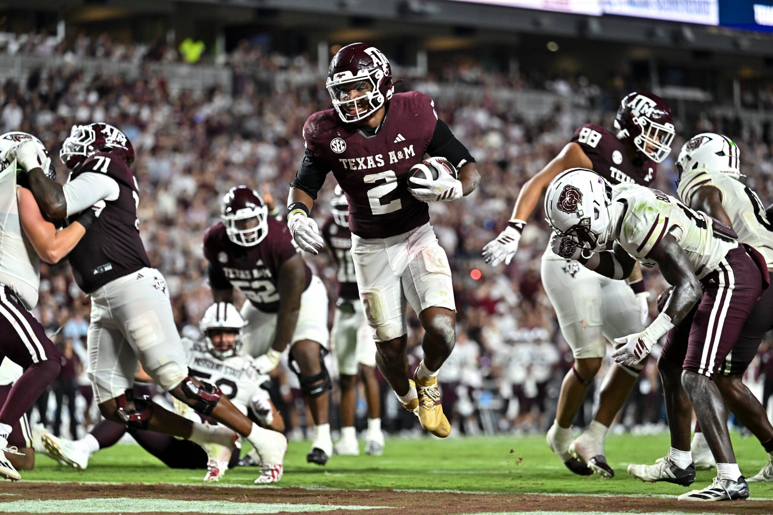 Sep 5, 2026; College Station, Texas, USA; Texas A&M Aggies running back Jamarion Morrow (2) scores a touchdown during the third quarter against the Missouri State Bears at Kyle Field.