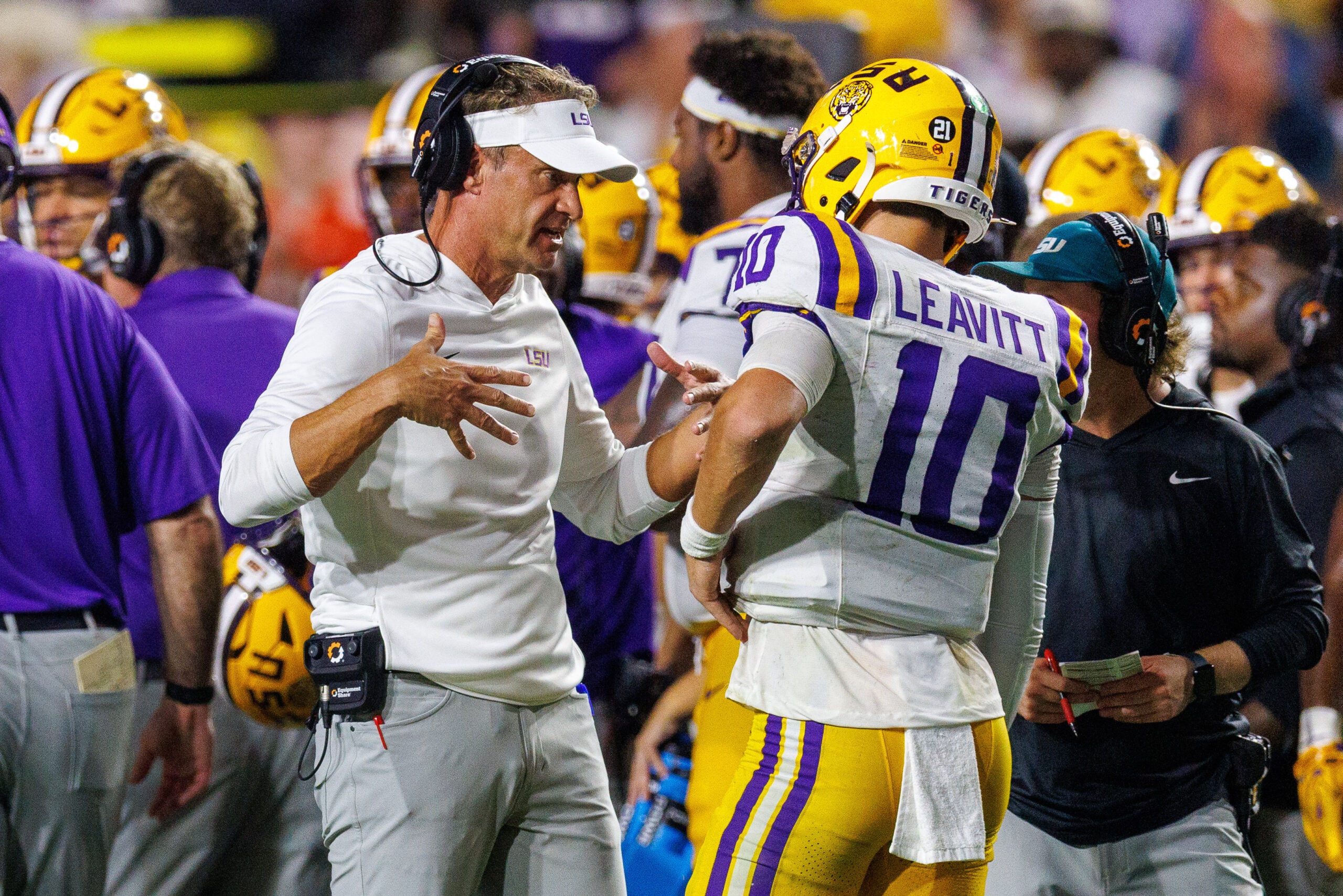 Sep 5, 2026; Baton Rouge, Louisiana, USA; LSU Tigers head coach Lane Kiffin talks to quarterback Sam Leavitt (10) against Clemson Tigers during the first half at Tiger Stadium.