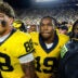 Michigan quarterback Bryce Underwood (19), center, and tight end Deakon Tonielli (88) exit the field after 13-12 win over Western Michigan at Michigan Stadium in Ann Arbor on Saturday, Sept. 5, 2026.