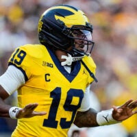 Michigan quarterback Bryce Underwood celebrates after scoring a touchdown against Western Michigan during the first quarter at Michigan Stadium in Ann Arbor on Saturday, Sept. 5, 2026.