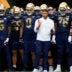 Notre Dame head coach Marcus Freeman prepares to take the field with his team before a NCAA football game against Wisconsin at Lambeau Field on Sunday, Sept. 6, 2026, in Green Bay, WI.