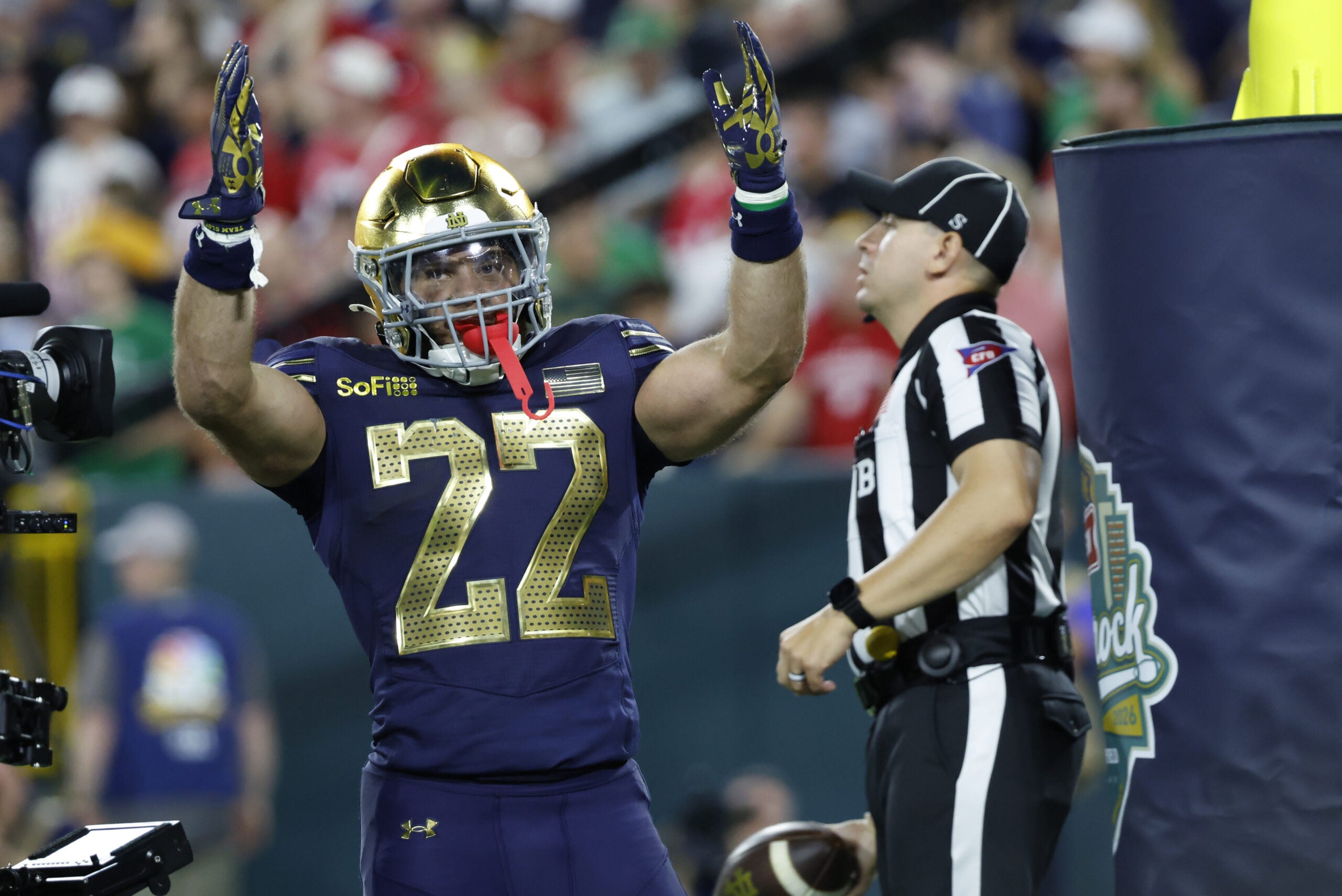 Sep 6, 2026; Green Bay, Wisconsin, USA; Notre Dame Fighting Irish running back Aneyas Williams (22) reacts after a touchdown against the Wisconsin Badgers at Lambeau Field.