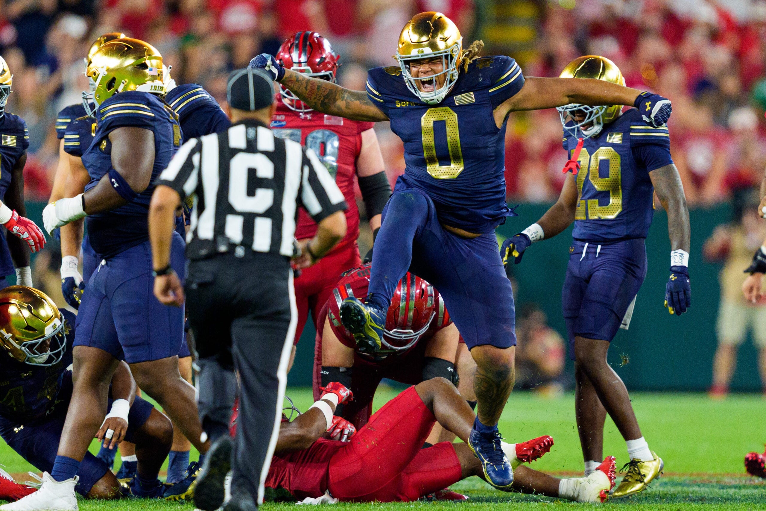 Notre Dame defensive lineman Tionne Gray (0) celebrates getting a stop during the second half of a NCAA football game against Wisconsin at Lambeau Field on Sunday, Sept. 6, 2026, in Green Bay, WI.