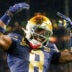 Notre Dame safety Adon Shuler celebrates after a touchdown during the second half of a NCAA football game against Wisconsin at Lambeau Field on Sunday, Sept. 6, 2026, in Green Bay, WI.