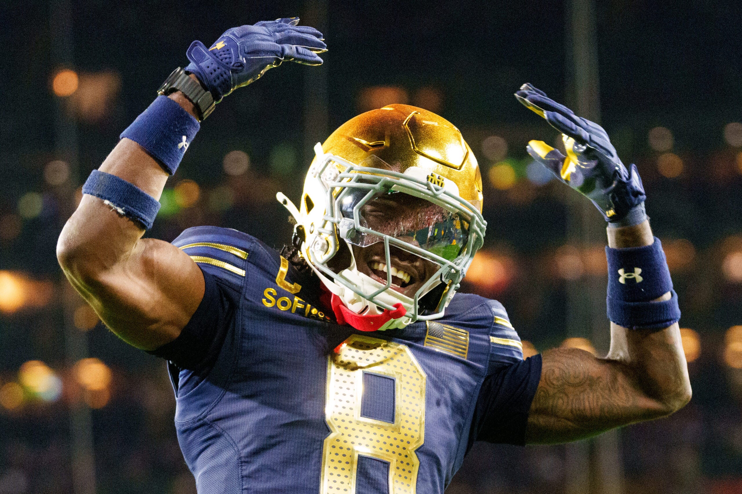 Notre Dame safety Adon Shuler celebrates after a touchdown during the second half of a NCAA football game against Wisconsin at Lambeau Field on Sunday, Sept. 6, 2026, in Green Bay, WI.