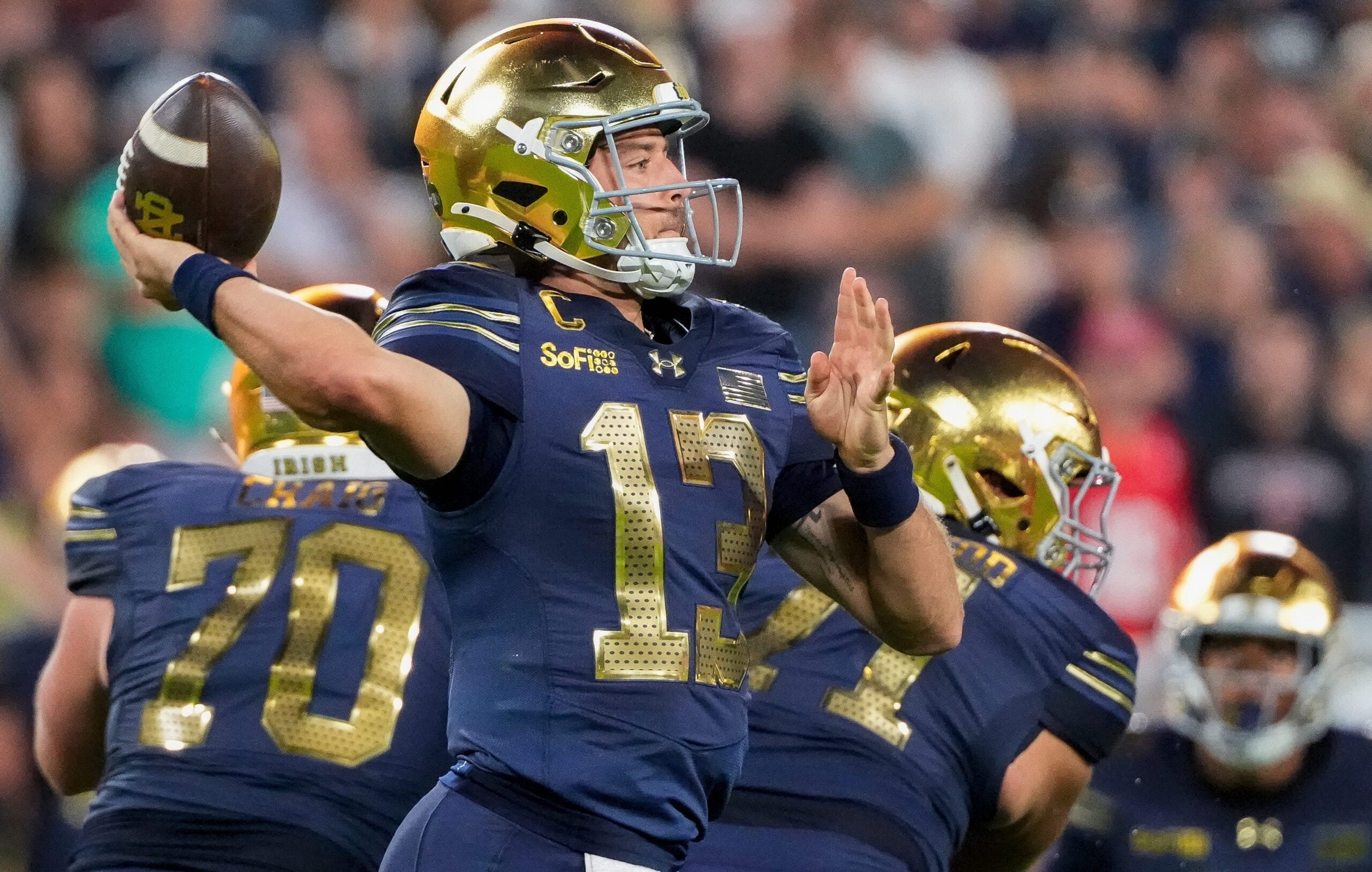 Notre Dame quarterback CJ Carr (13) passes the ball against Wisconsin on Sunday, Sept. 6, 2026, at Lambeau Field in Green Bay, Wisconsin. Notre Dame won the game, 41-13.