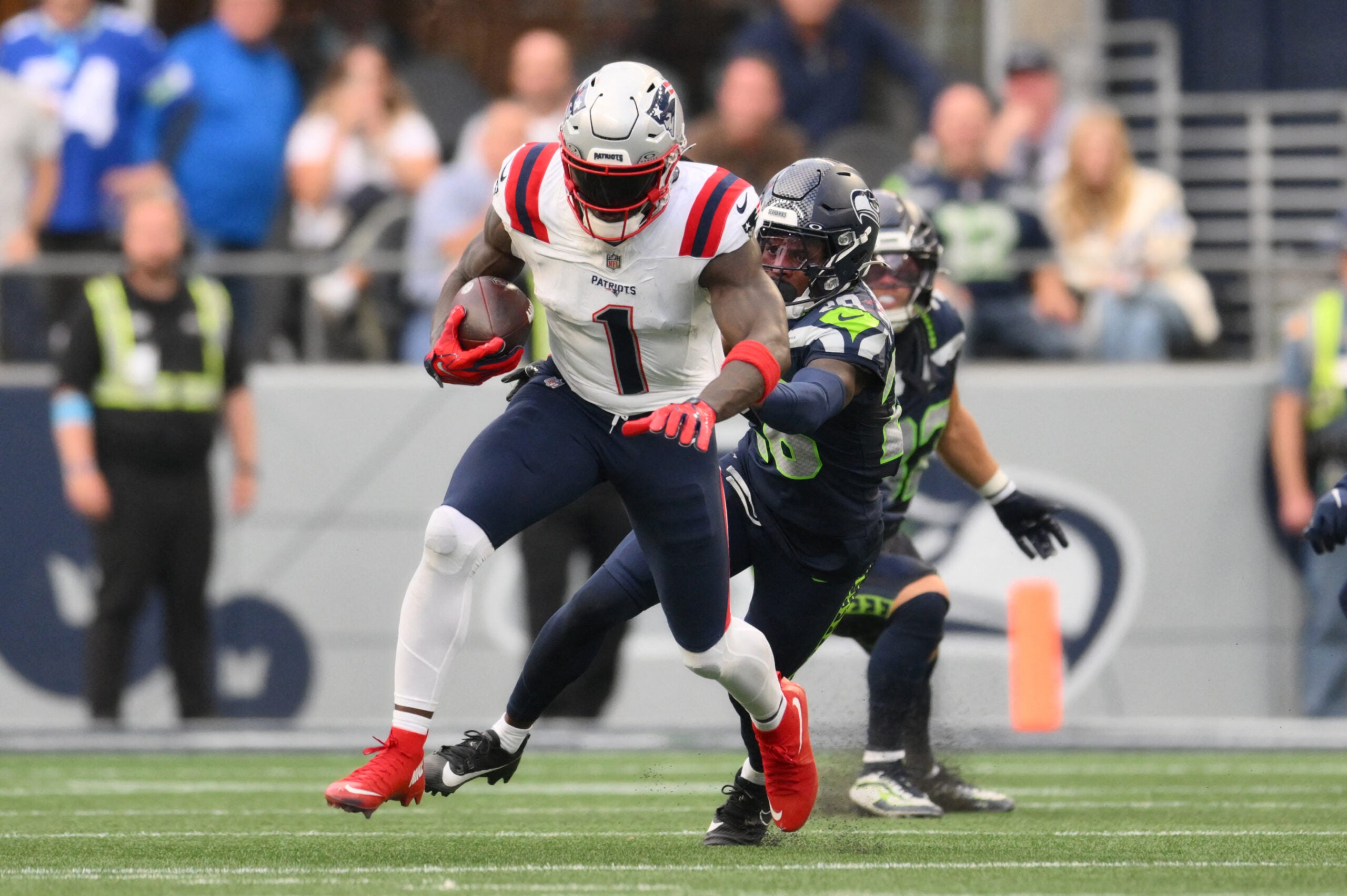 Sep 9, 2026; Seattle, Washington, USA; New England Patriots wide receiver A.J. Brown (1) runs after a catch during the second quarter against the Seattle Seahawks at Lumen Field.
