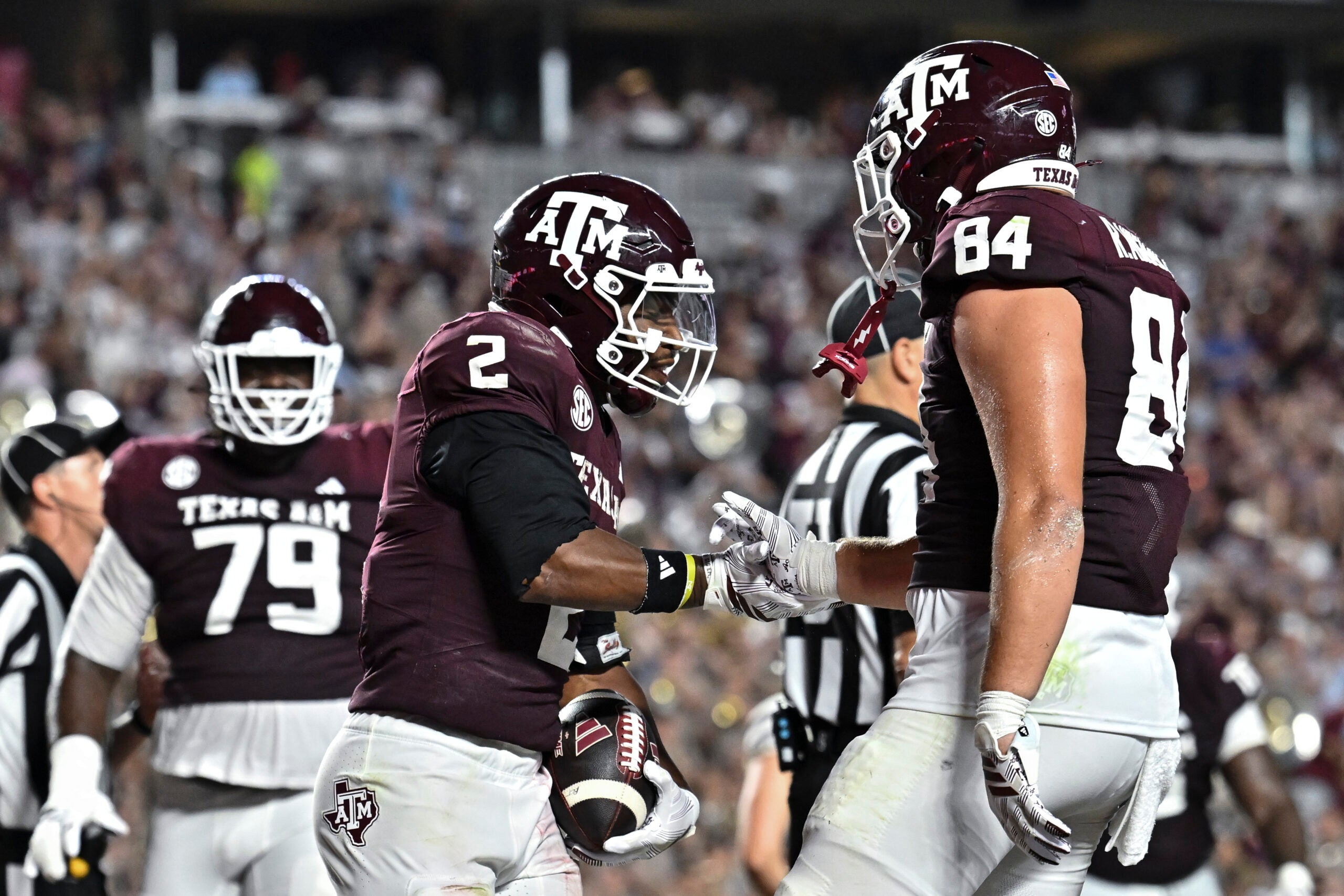 Sep 5, 2026; College Station, Texas, USA; Texas A&M Aggies running back Jamarion Morrow (2) celebrates after scoring a touchdown with tight end Richie Anderson III (84) during third quarter against the Missouri State Bears at Kyle Field.