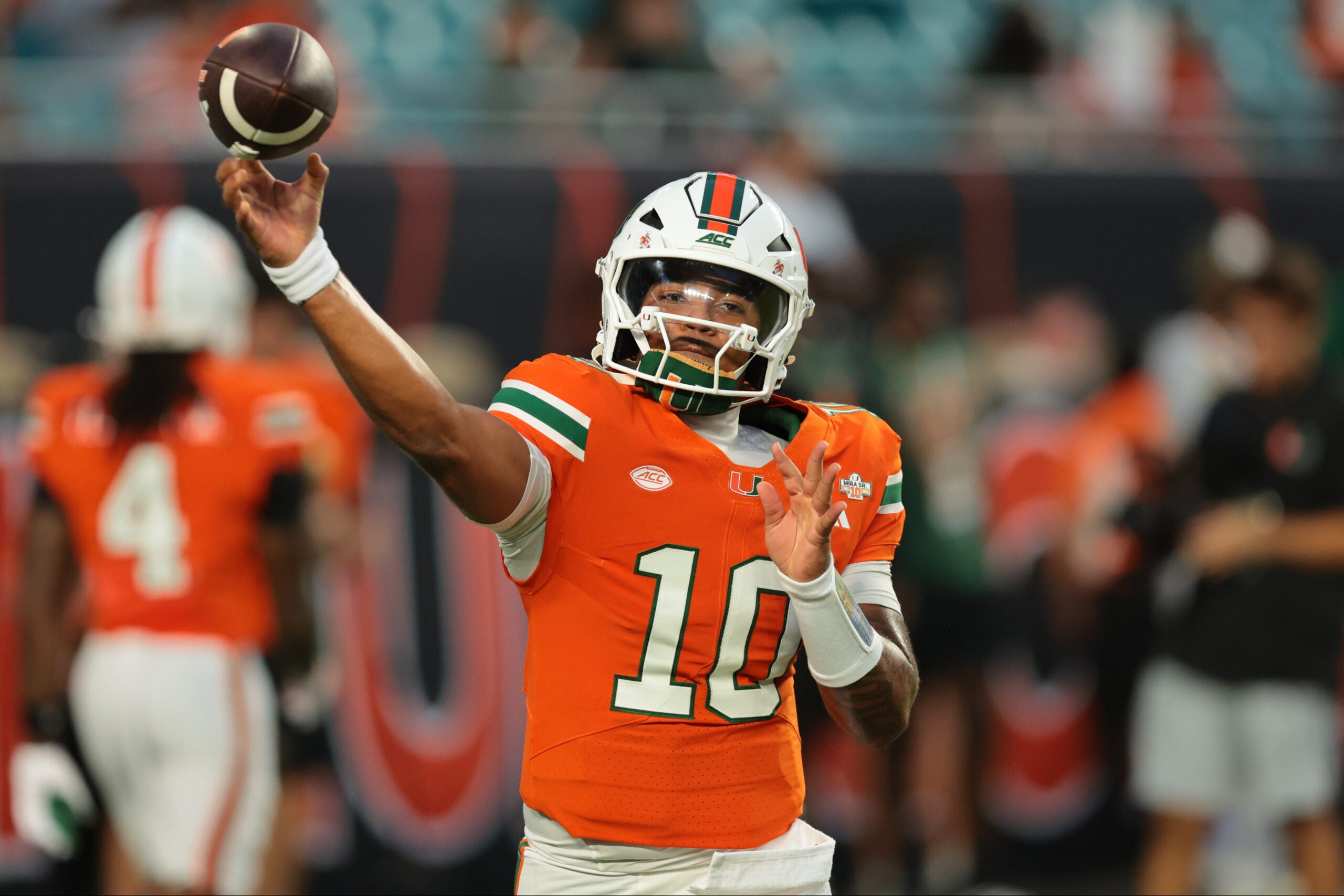 Sep 10, 2026; Miami Gardens, Florida, USA; Miami Hurricanes quarterback Darian Mensah (10) warms up before the game against the Florida A&M Rattlers at Hard Rock Stadium.