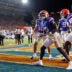 Sep 5, 2026; Gainesville, Florida, USA; Florida Gators running back Jadan Baugh (13) gestures with teammates against the Florida Atlantic Owls during the second half at Ben Hill Griffin Stadium.