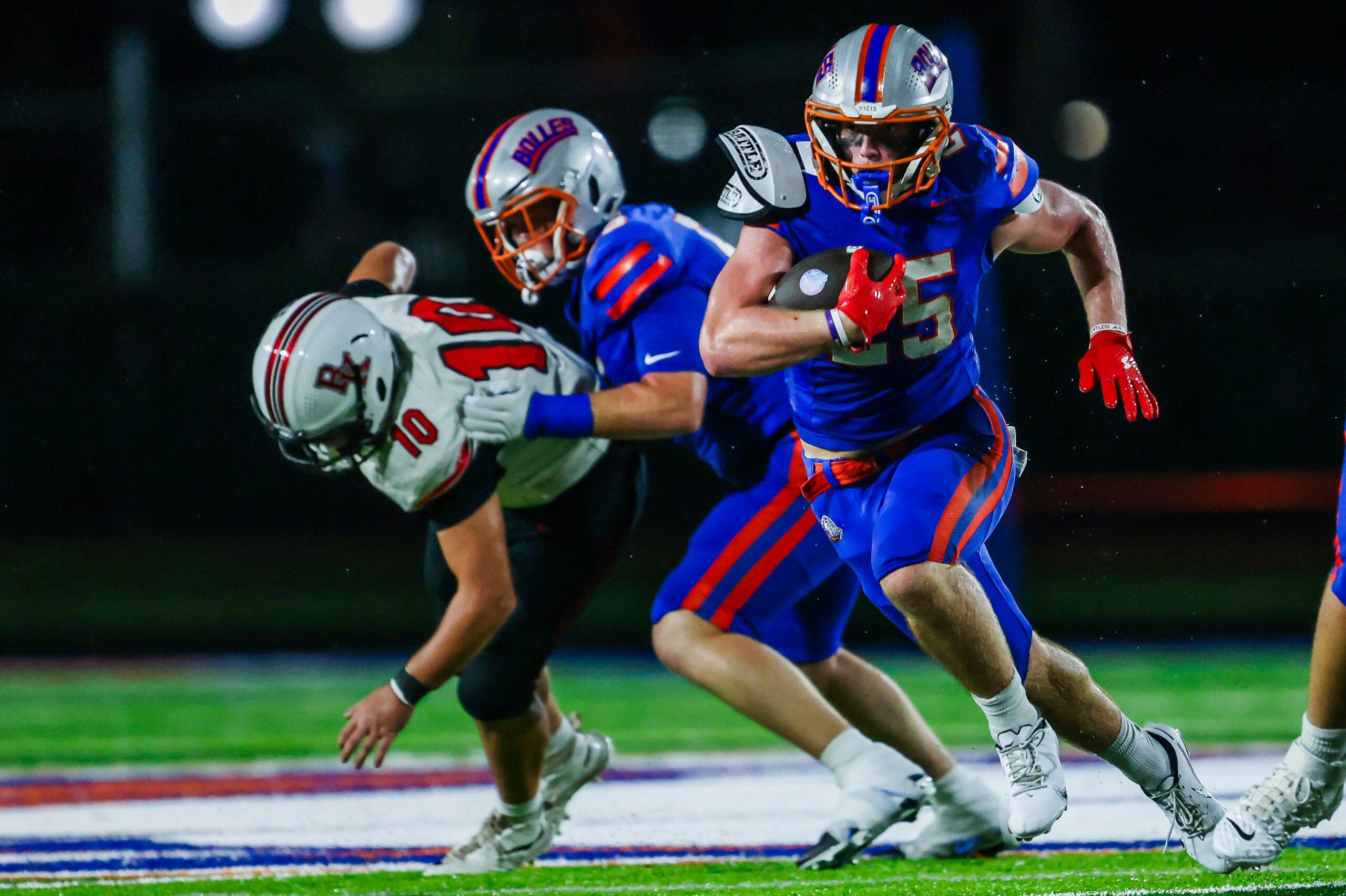 Bolles Bulldogs running back Xander Edwards (25) finds a hole in the first quarter. The Bolles Bulldogs hosted the Bishop Kenny Crusaders Friday September 11, 2026 at Bolles School in Jacksonville, Fla. Bolles lead 21-6 at the half.