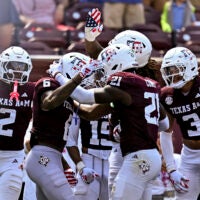 Sep 12, 2026; College Station, Texas, USA; Texas A&M Aggies cornerback Julio Humphrey (6) celebrates with teammates after running an interception back for a touchdown against Arizona State Sun Devils at Kyle Field.