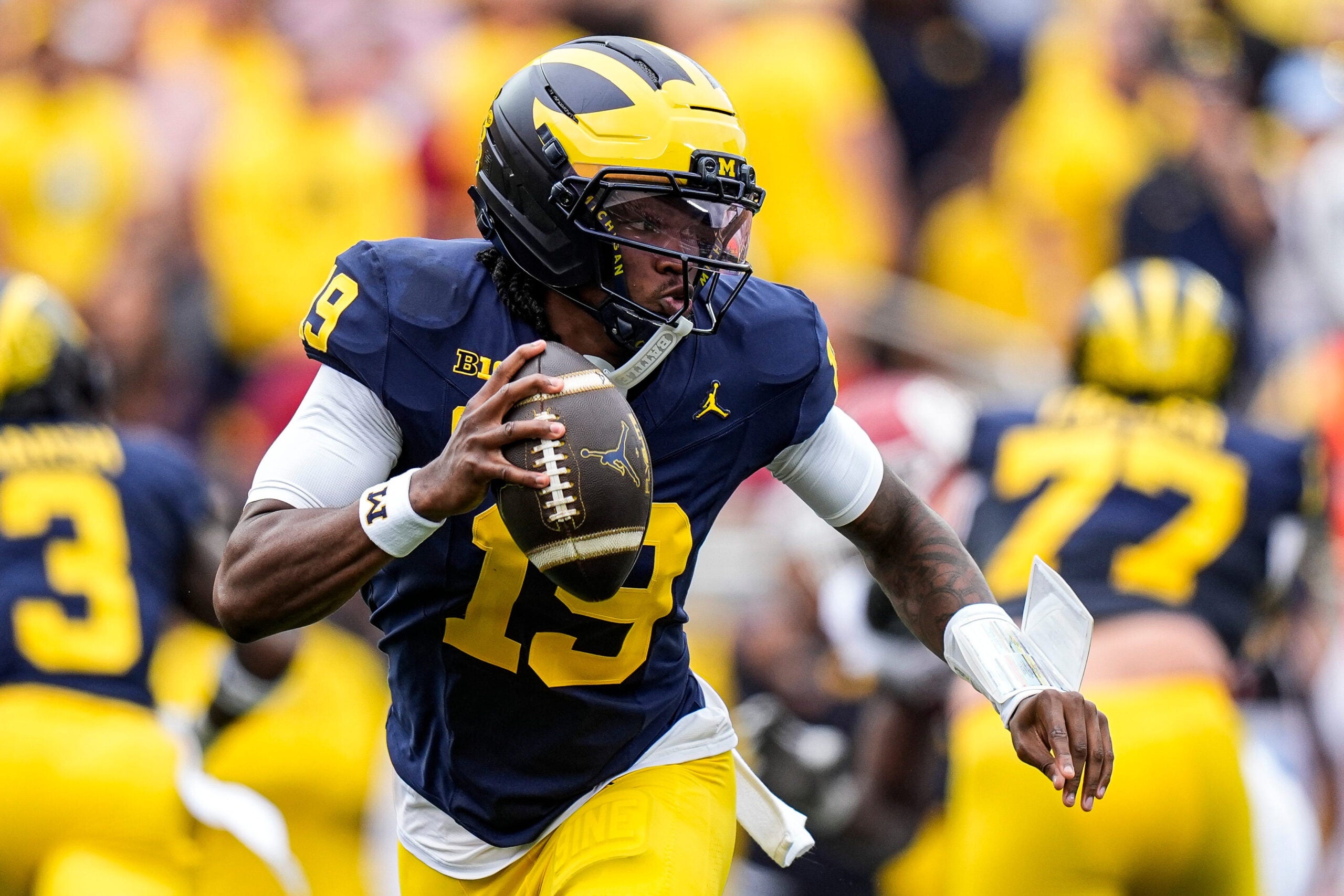 Michigan quarterback Bryce Underwood (19) runs against Oklahoma during the first half at Michigan Stadium in Ann Arbor on Saturday, Sept. 12, 2026.