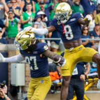Sep 12, 2026; South Bend, Indiana, USA; Notre Dame Fighting Irish safety Adon Shuler (8) celebrates with linebacker Kyngstonn Viliamu-Asa (27) after a turnover during the first half at Notre Dame Stadium.