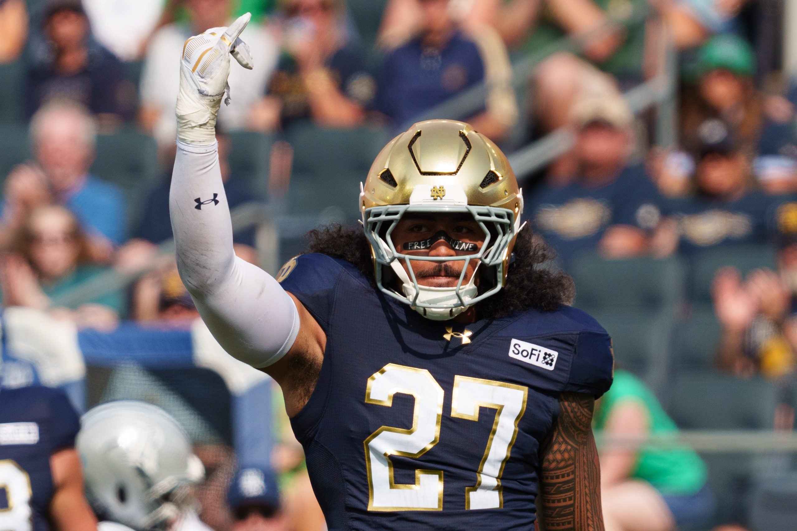 Notre Dame linebacker Kyngstonn Viliamu-Asa celebrates after getting a stop during a NCAA football game against Rice at Notre Dame Stadium on Saturday, Sept. 12, 2026, in South Bend.