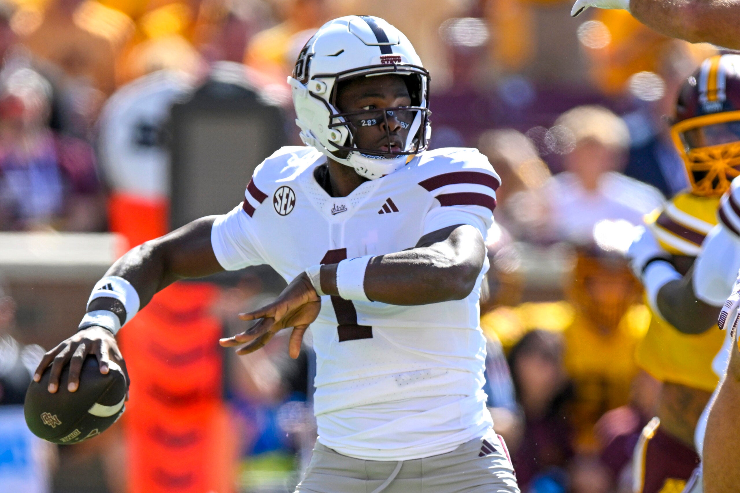 Sep 12, 2026; Minneapolis, Minnesota, USA; Mississippi State Bulldogs quarterback Kamario Taylor (1) throws a pass against the Minnesota Golden Gophers during the first quarter at Huntington Bank Stadium.