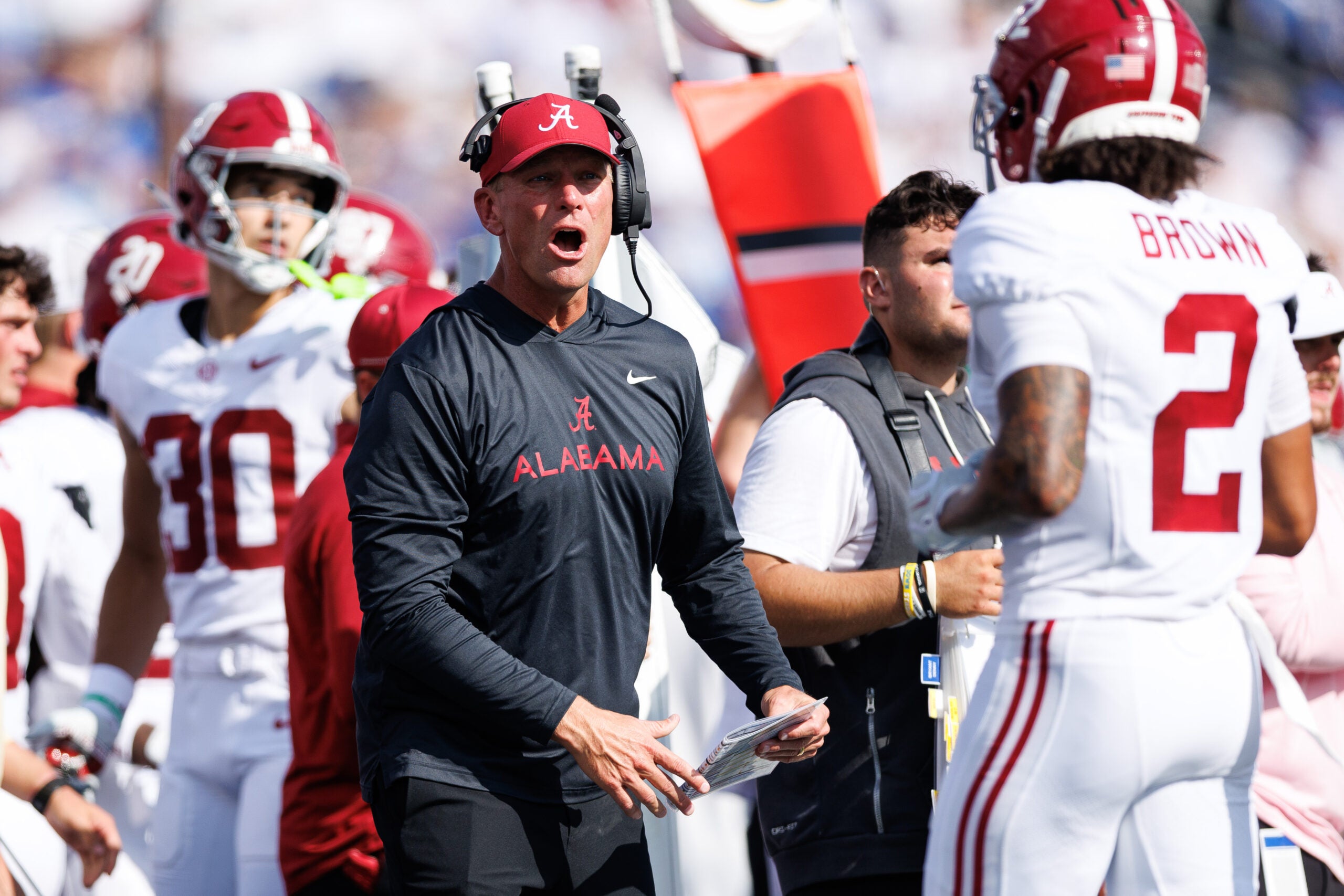 Sep 12, 2026; Lexington, Kentucky, USA; Alabama Crimson Tide head coach Kalen DeBoer talks with defensive back Zabien Brown (2) as he returns to the sideline during the second quarter against the Kentucky Wildcats at Kroger Field.