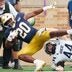 Rice linebacker Cooper King (44) tackles Notre Dame running back Jonaz Walton (20) during a NCAA football game at Notre Dame Stadium on Saturday, Sept. 12, 2026, in South Bend.