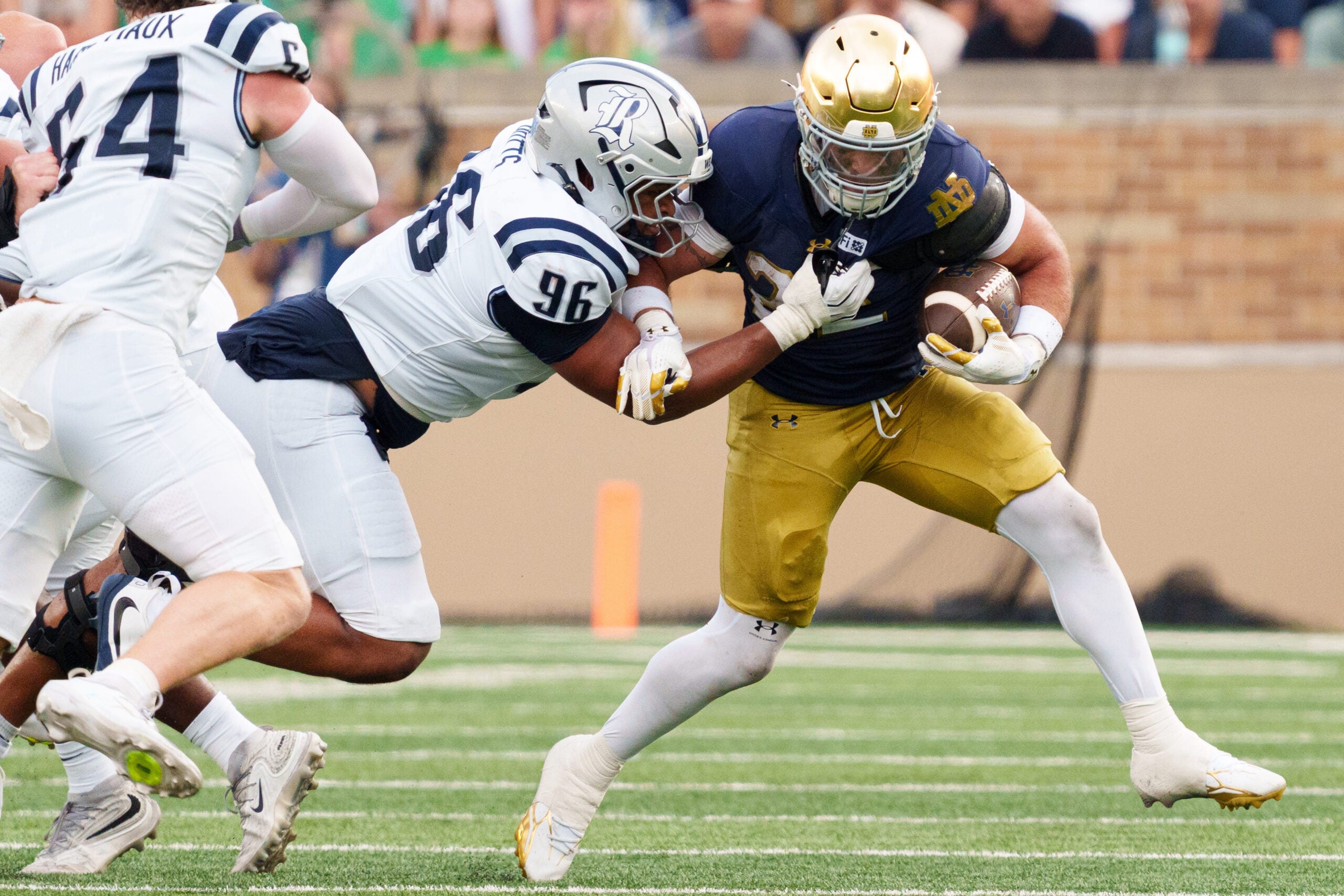 Notre Dame running back Aneyas Williams, right, rushes the ball during a NCAA football game against Rice at Notre Dame Stadium on Saturday, Sept. 12, 2026, in South Bend.