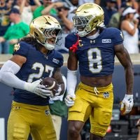 Sep 12, 2026; South Bend, Indiana, USA; Notre Dame Fighting Irish safety Adon Shuler (8) celebrates with linebacker Kyngstonn Viliamu-Asa (27) after a turnover during the first half at Notre Dame Stadium.