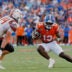 Sep 12, 2026; Gainesville, Florida, USA; Florida Gators running back Jadan Baugh (13) runs the ball against Campbell Fighting Camels linebacker Landon Sargent (44) during the first half at Ben Hill Griffin Stadium.