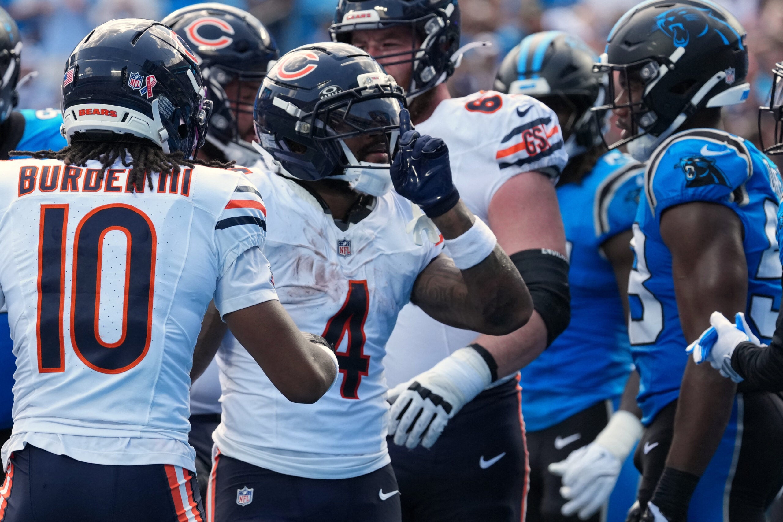 Sep 13, 2026; Charlotte, North Carolina, USA; Chicago Bears running back D'Andre Swift (4) reacts after scoring a touchdown in the first quarter against against the Carolina Panthers at Bank of America Stadium.