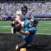 Sep 13, 2026; Charlotte, North Carolina, USA; Carolina Panthers tight end Mitchell Evans (84) is unable to make the catch while defended by Chicago Bears safety Dillon Thieneman (31) in the first quarter at Bank of America Stadium.