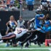 Sep 13, 2026; Charlotte, North Carolina, USA; Carolina Panthers wide receiver Jalen Coker (18) catches the ball while defended by Chicago Bears defensive back Tyrique Stevenson (29) in the second quarter at Bank of America Stadium.
