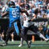 Sep 13, 2026; Charlotte, North Carolina, USA; Chicago Bears quarterback Caleb Williams (18) throws while pressured by Carolina Panthers defensive tackle Derrick Brown (95) in the third quarter at Bank of America Stadium.