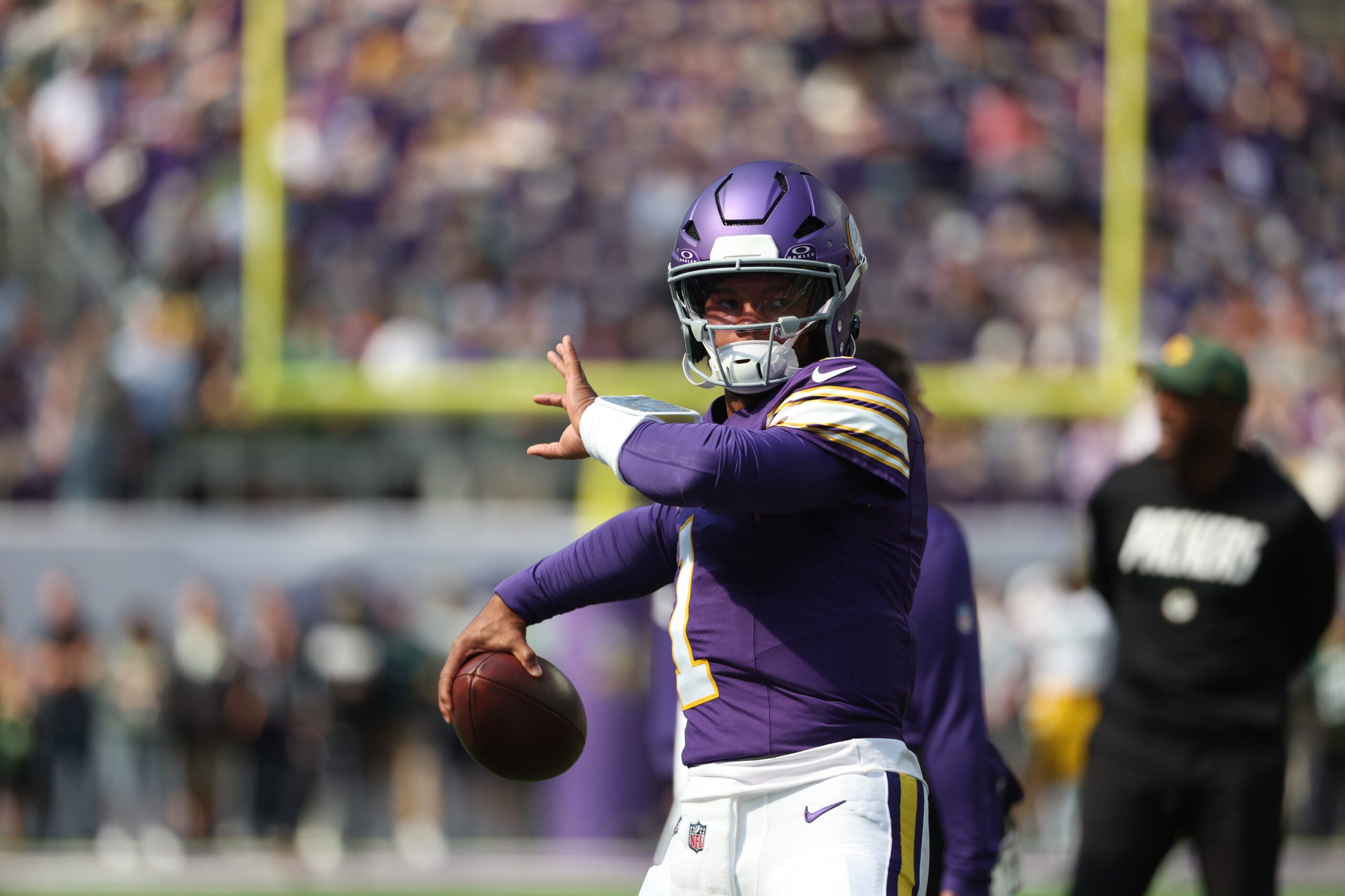 Sep 13, 2026; Minneapolis, Minnesota, USA; Minnesota Vikings quarterback Kyler Murray (1) warms up before the game against the Green Bay Packers at U.S. Bank Stadium.