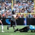 Sep 13, 2026; Charlotte, North Carolina, USA; Chicago Bears wide receiver Kalif Raymond (14) is tackled by Carolina Panthers cornerback Will Lee III (24) in the fourth quarter at Bank of America Stadium.