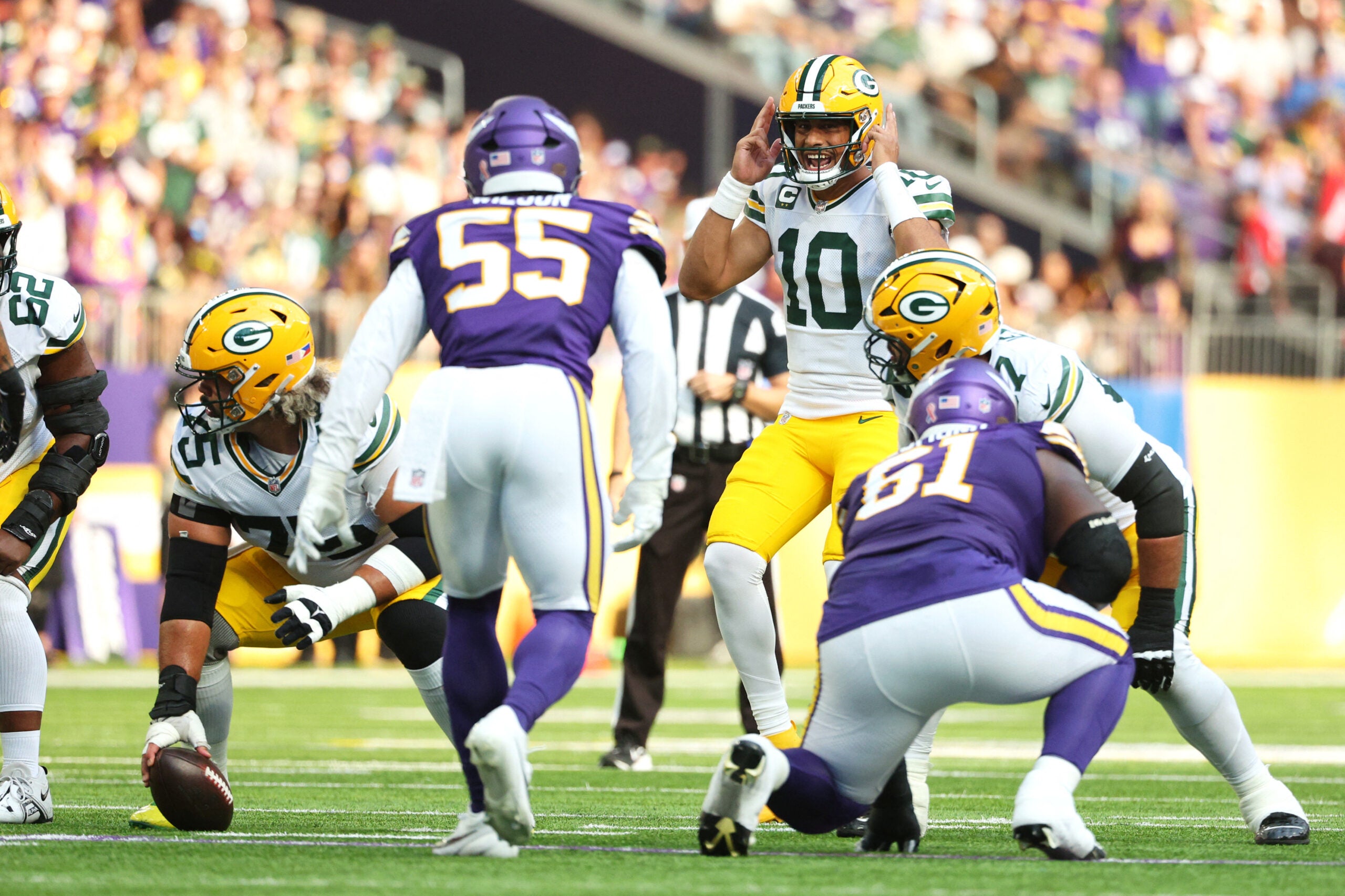 Sep 13, 2026; Minneapolis, Minnesota, USA; Green Bay Packers quarterback Jordan Love (10) reacts before a play during the first half against the Minnesota Vikings at U.S. Bank Stadium.