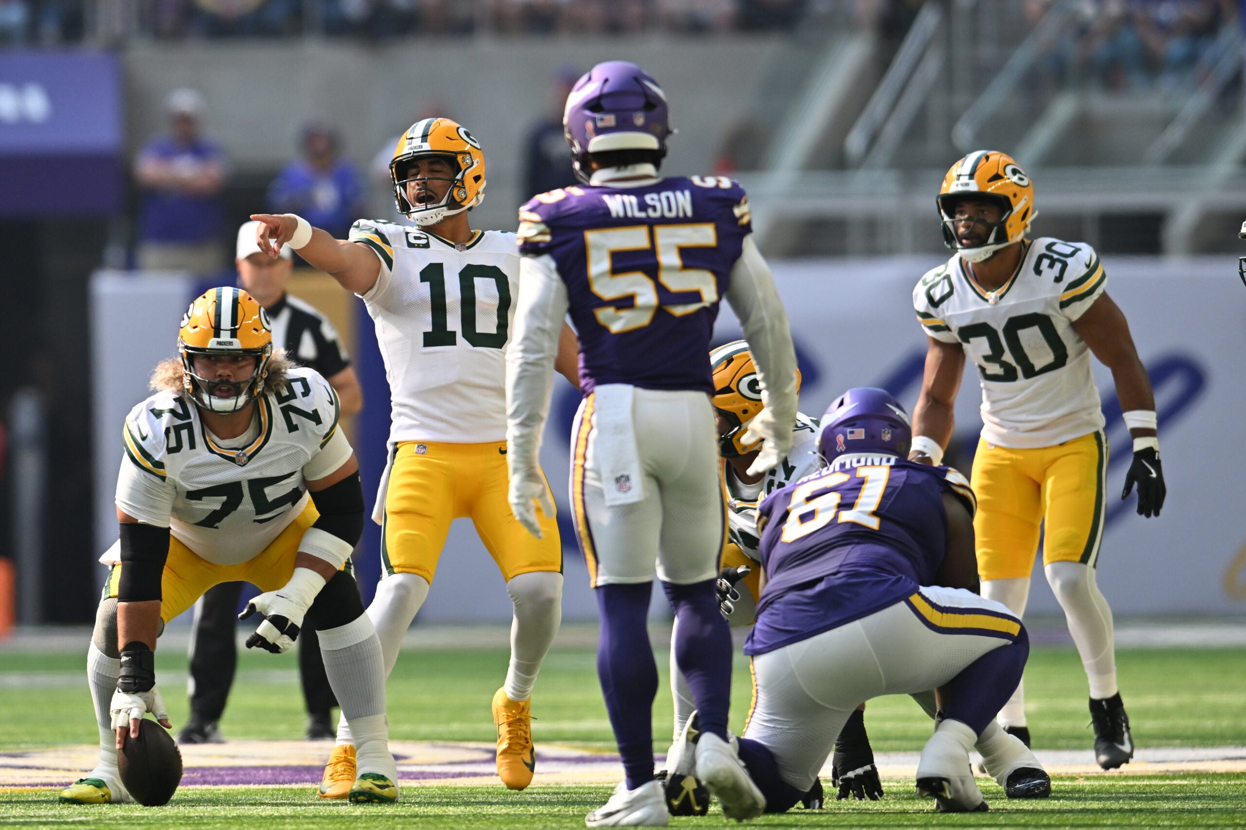 Sep 13, 2026; Minneapolis, Minnesota, USA; Green Bay Packers quarterback Jordan Love (10) calls out the play during the first half against the Minnesota Vikings at U.S. Bank Stadium.