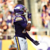 Sep 13, 2026; Minneapolis, Minnesota, USA; Minnesota Vikings wide receiver Justin Jefferson (18) reacts after a play during the first half against the Green Bay Packers at U.S. Bank Stadium.