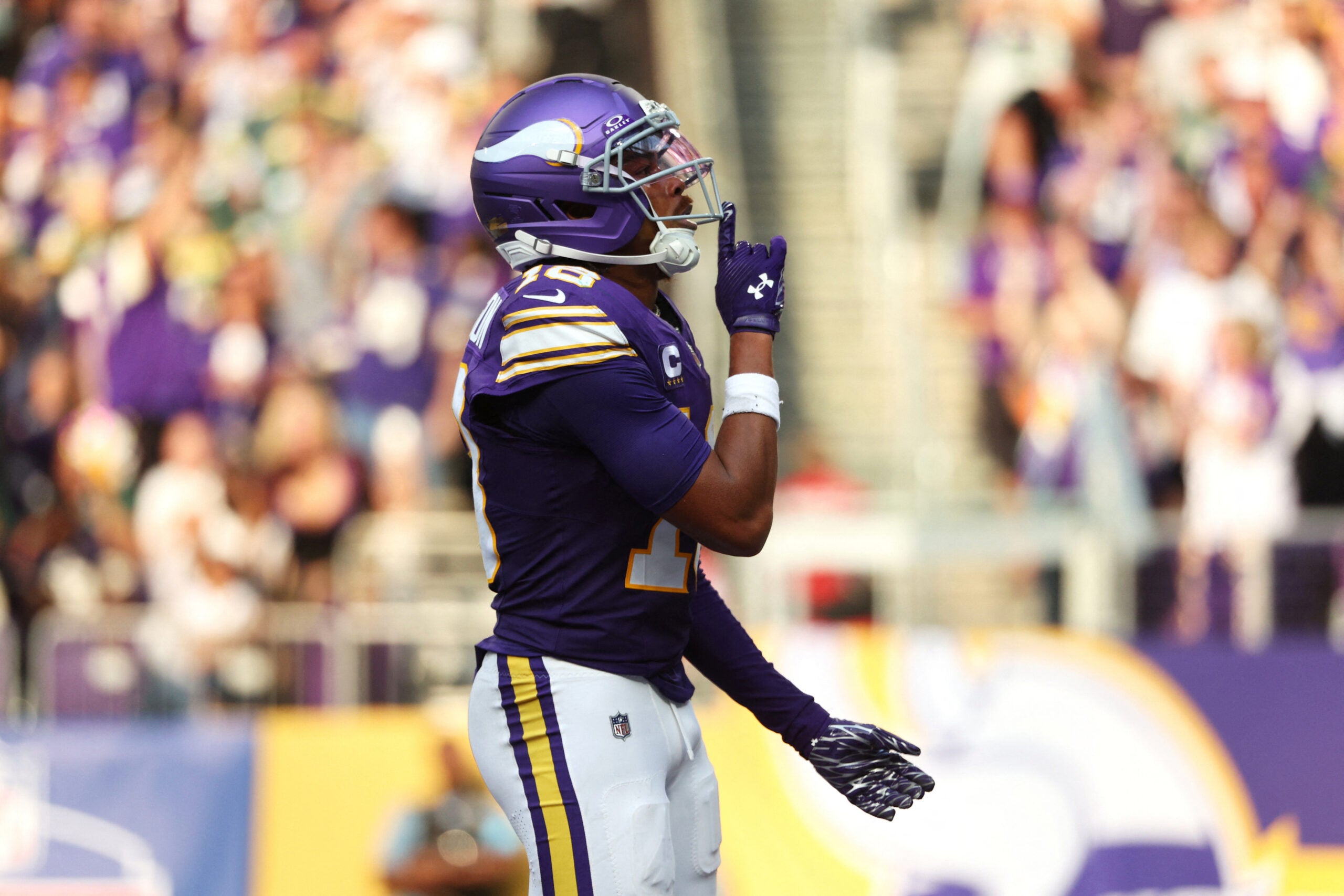 Sep 13, 2026; Minneapolis, Minnesota, USA; Minnesota Vikings wide receiver Justin Jefferson (18) reacts after a play during the first half against the Green Bay Packers at U.S. Bank Stadium.