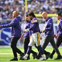 Sep 13, 2026; Minneapolis, Minnesota, USA; Minnesota Vikings quarterback Kyler Murray (1) walks off the field after a hard hit during the first half against the Green Bay Packers at U.S. Bank Stadium.