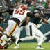 Sep 13, 2026; Philadelphia, Pennsylvania, USA; Washington Commanders defensive tackle Javon Kinlaw (99) sacks Philadelphia Eagles quarterback Jalen Hurts (1) during the second half at Lincoln Financial Field.