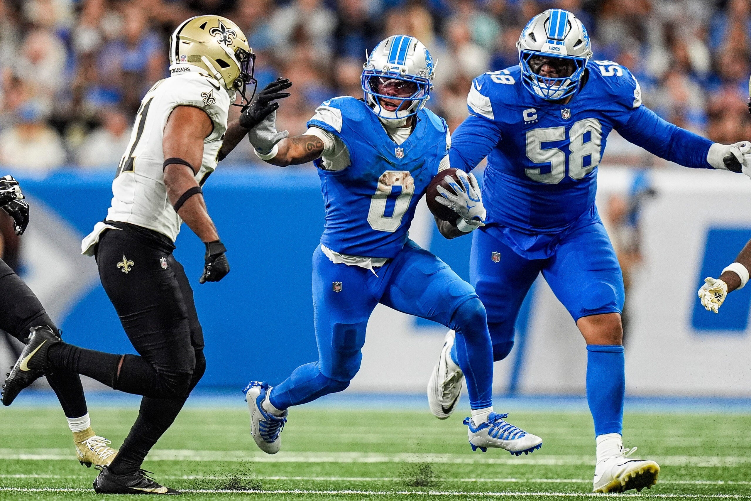 2026-09-13T234942Z_1782817639_MT1USATODAY29816570_RTRMADP_3_DETROIT-LIONS-RUNNING-BACK-JAHMYR-GIBBS-RUNS-AGAINST-THE-NEW-scaled.jpg