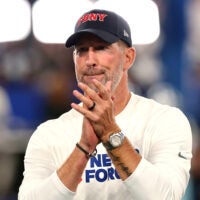 Sep 13, 2026; East Rutherford, New Jersey, USA; Dallas Cowboys head coach Brian Schottenheimer looks on during warmups prior to the game against the Dallas Cowboys at MetLife Stadium.